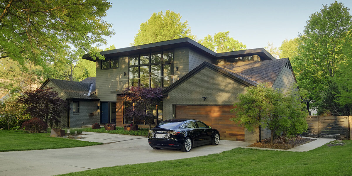 Contemporary home with an EV in the driveway